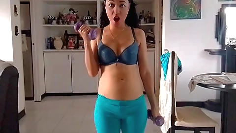 Sexy amateur brunette babe is stripping naked in front of the camera