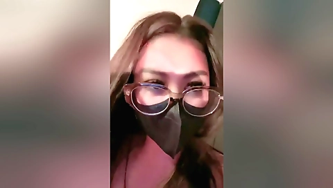 A gorgeous brunette has a tight pussy in her bed video