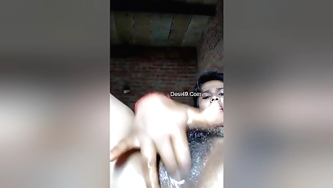 Indian brunette is fingering her hairy pussy on webcam
