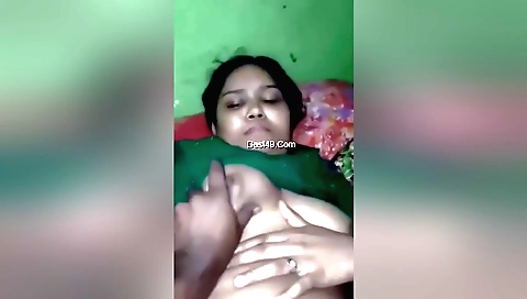 Indian brunette girl with a red dress in the pov video