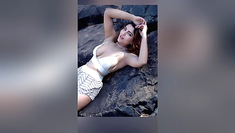 Redhead gets her pussy licked by her man on the beach