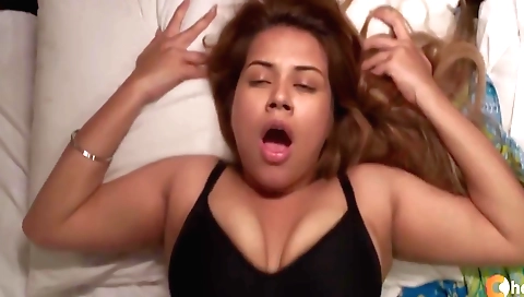 Brunette with big boobs is having a threesome in the living room