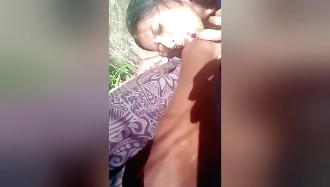 Indian brunette girl in khaki shorts rides cock outdoors
