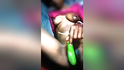 Indian housewife masturbates with a dildo in her hairy pussy