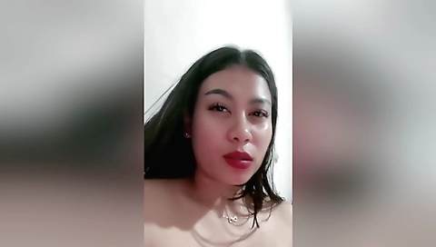 Solo female video with a hot brunette with natural boobs