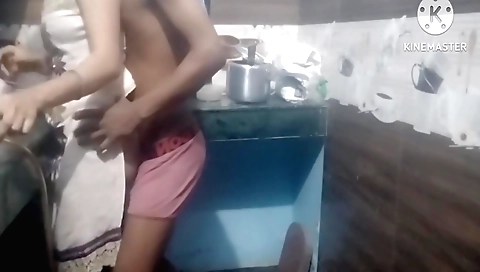 Indian step daughter fucks the neighbor in the kitchen