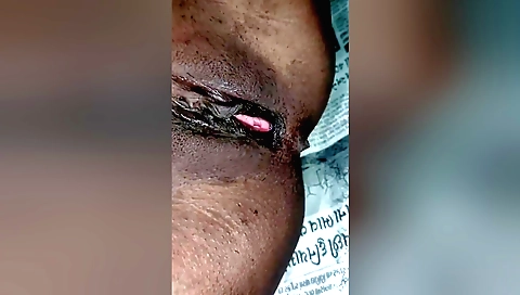 Indian girl gets naked and spreads hairy legs and body