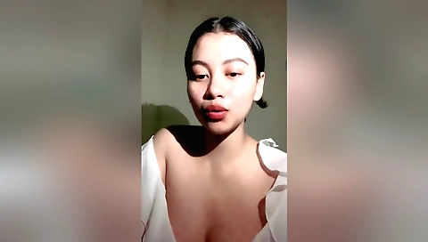 Indian hottie with natural boobs is fingering her wet pussy