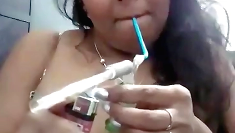 Bhuti in red bikini enjoys hookah and moans on webcam