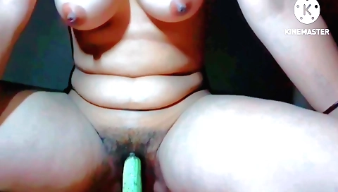 Indian girl is wetting her pussy and enjoying a dildo