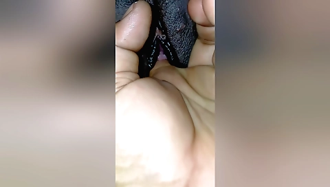 Indian girl in a bikini is sucking and fingering a dick