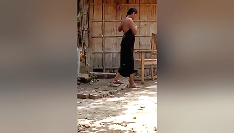 Indian brunette with natural boobs undresses in bathroom
