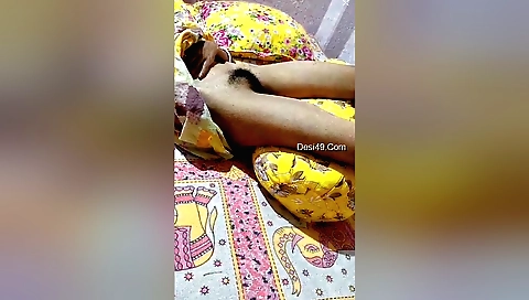 Hairy indian girl rubs her pussy and enjoys the sensation