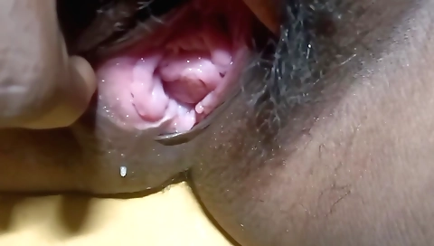 Amateur solo female with hairy pussy is masturbated
