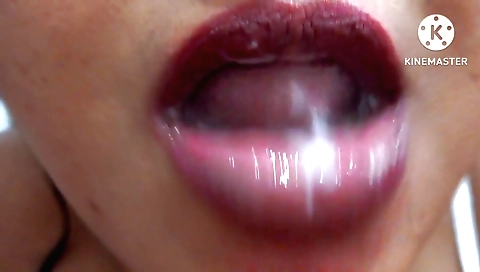 Busty blonde with a tight bikini gives a handjob to a guy