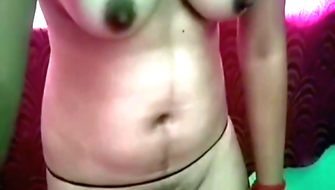 Amateur brunette with hairy pussy shows off her big tits