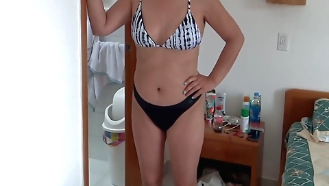 Amateur brunette girl rides a cock after she shows off on the beach
