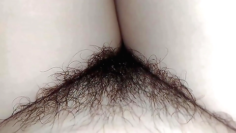 Indian hairy girl enjoys licking pussy in solo porn
