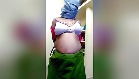 Indian chick is playing with her big ass and her big boobs