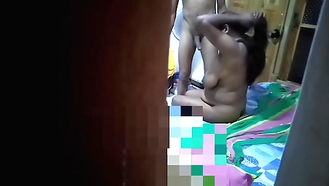 A brunette gets her pussy fucked by two guys in a gangbang