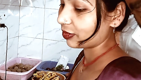 Indian amateur woman is doing things in the kitchen