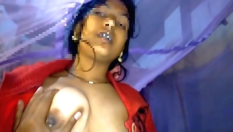Brunette beauty shows her big natural tits in this video