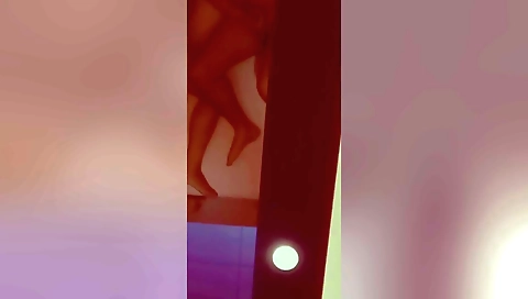 Brunette milf wife is receiving a handjob by handsome friend