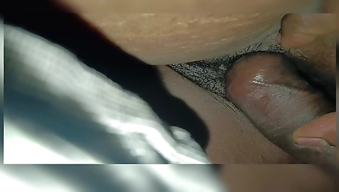 Indian woman gets off with a guy in her hairy cunt